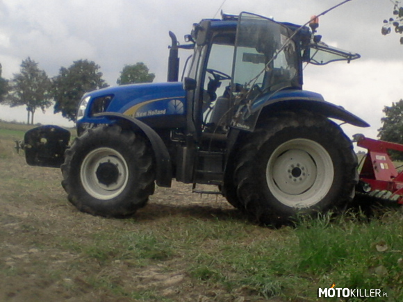 New Holland T6010 –  