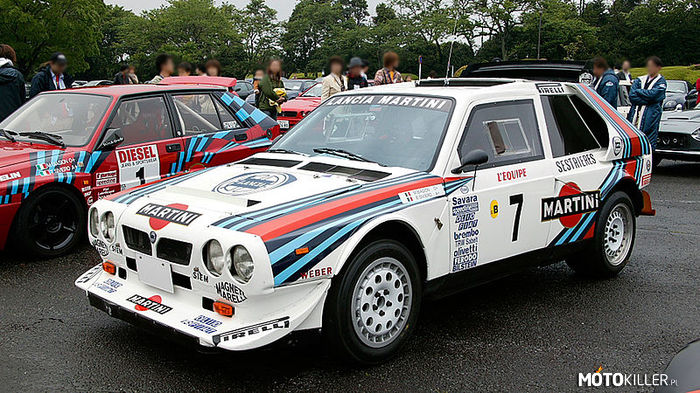 Mistrzowie WRC-1988, 1989 Massimo &quot;Miki&quot; Biasion – Massimo &quot;Miki&quot; Biasion (ur. 7 stycznia 1958 w Bassano del Grappa) – włoski kierowca wyścigowy, dwukrotny rajdowy mistrz świata.

Pierwsze rajdowe sukcesy zaczął odnosić na początku lat 80. XX wieku, zdobywając w 1983 r. tytuły mistrza Europy oraz mistrza Włoch (jadąc samochodem Lancia Rally 037). W 1986 r. po raz pierwszy zwyciężył w eliminacji mistrzostw świata (w Rajdzie Argentyny, samochodem Lancia Delta S4). Do 1993 r. na podium rajdów WRC stanął 40 razy, w tym 17 razy na najwyższym stopniu.

Najlepszymi sezonami w karierze Massimo Biasiona były lata 1988 i 1989, w których zdobył tytuły mistrza świata. W 1987 r. w końcowej klasyfikacji zajął II miejsce (za Juha Kankkunenem), natomiast w latach 1990 - 1993 czterokrotnie z rzędu kończył mistrzostwa świata na IV miejscach.

W 1998 i 1999 r. w samochodzie Iveco dwukrotnie zwyciężył w mistrzostwach świata samochodów ciężarowych (ang. World Truck Championship). 